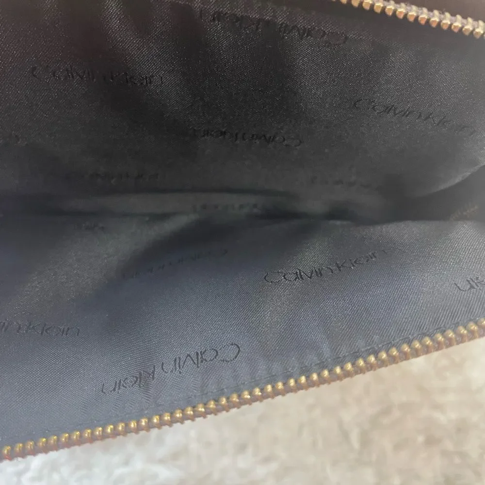 Calvin Klein Tan and Brown Logos  small Backpack logo tone hardwares.